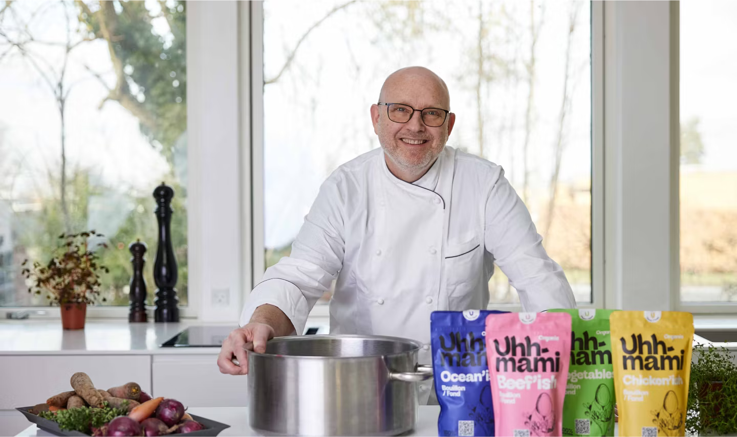Uhhmami founder chef in his kitchen with the bouillon range